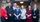 group of healthcare providers standing in front of building
