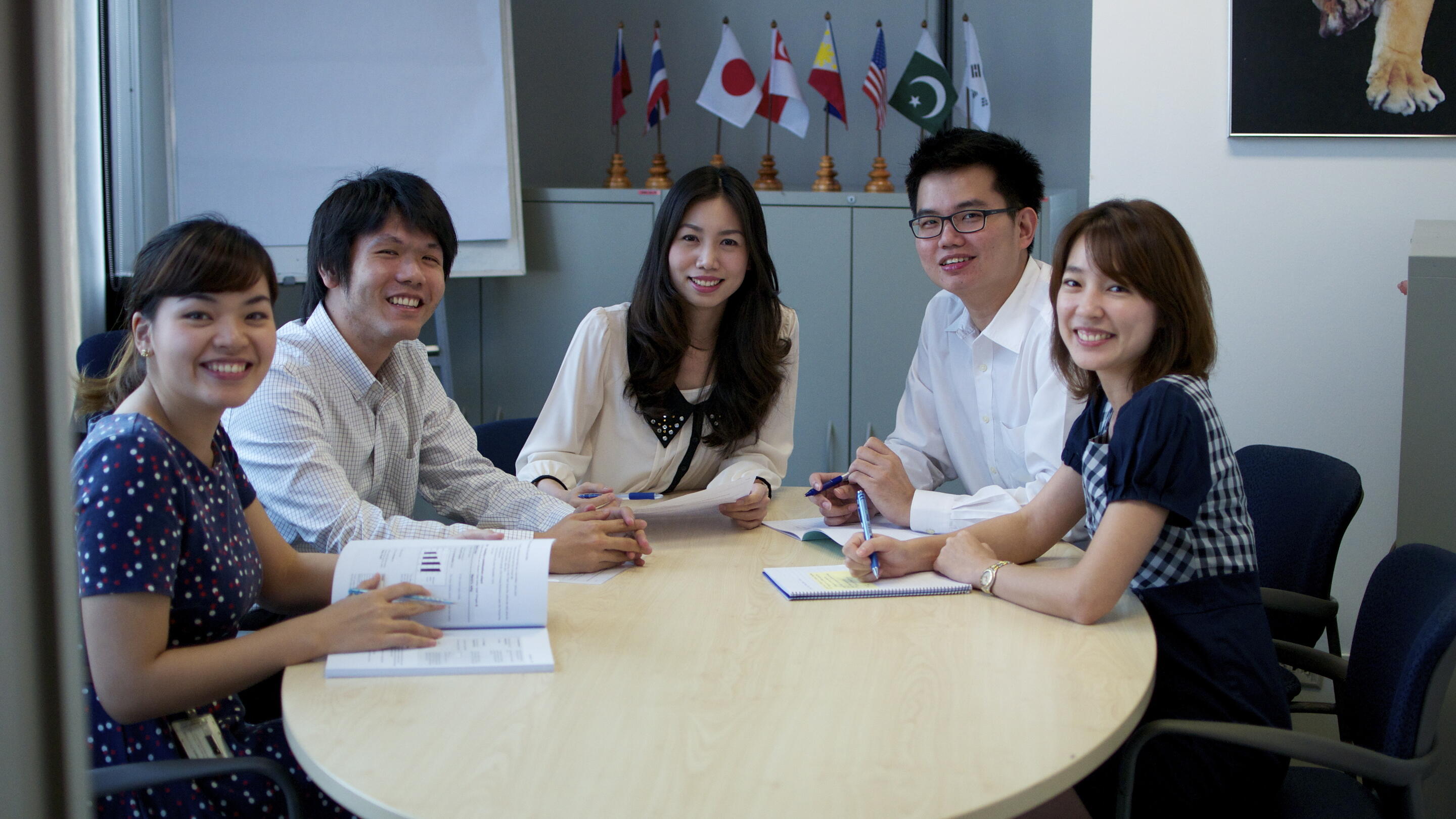 Thailand employees working at office table