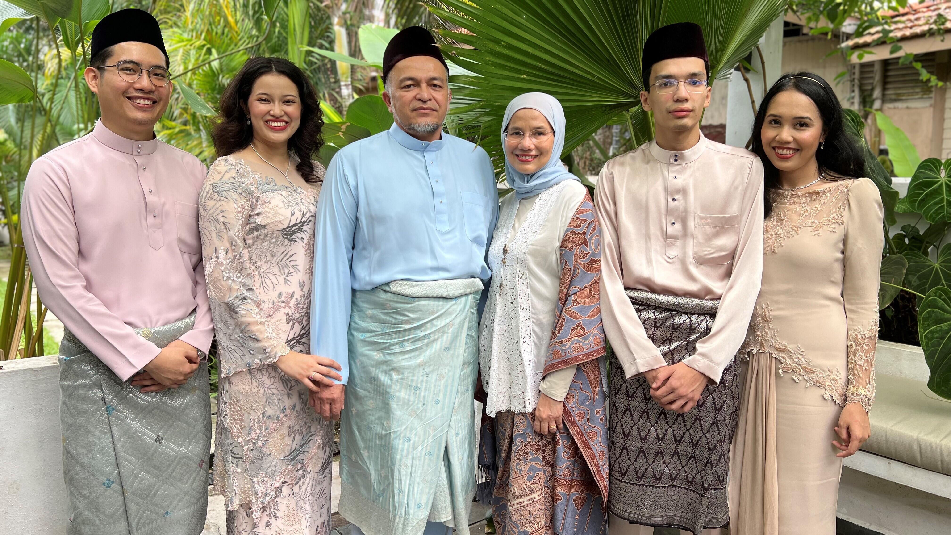 ExxonMobil Malaysia employee, Intanwati Abu Bakar, standing with her family