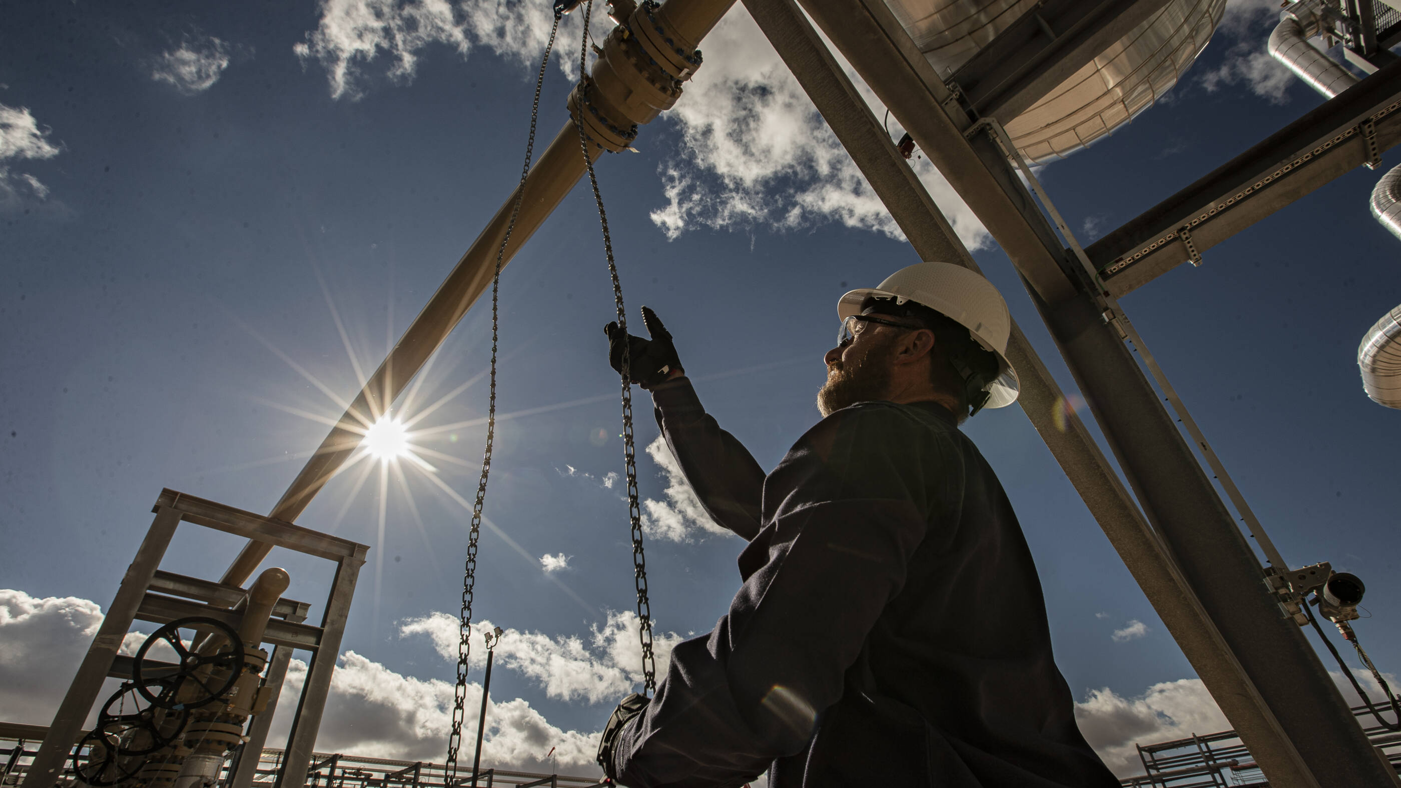 ExxonMobil employee pulling chain at facility in New Mexico