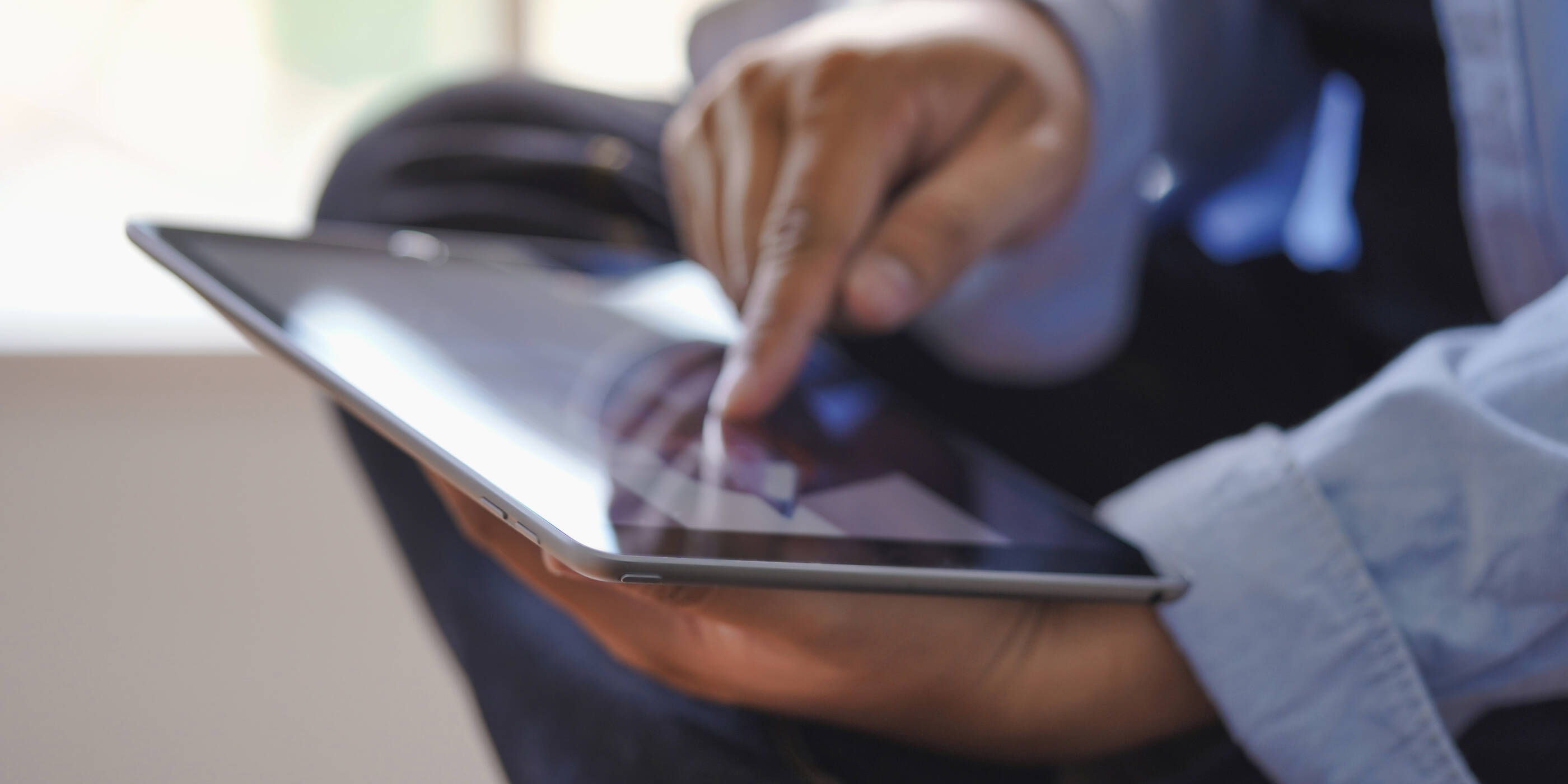Person using digital tablet
