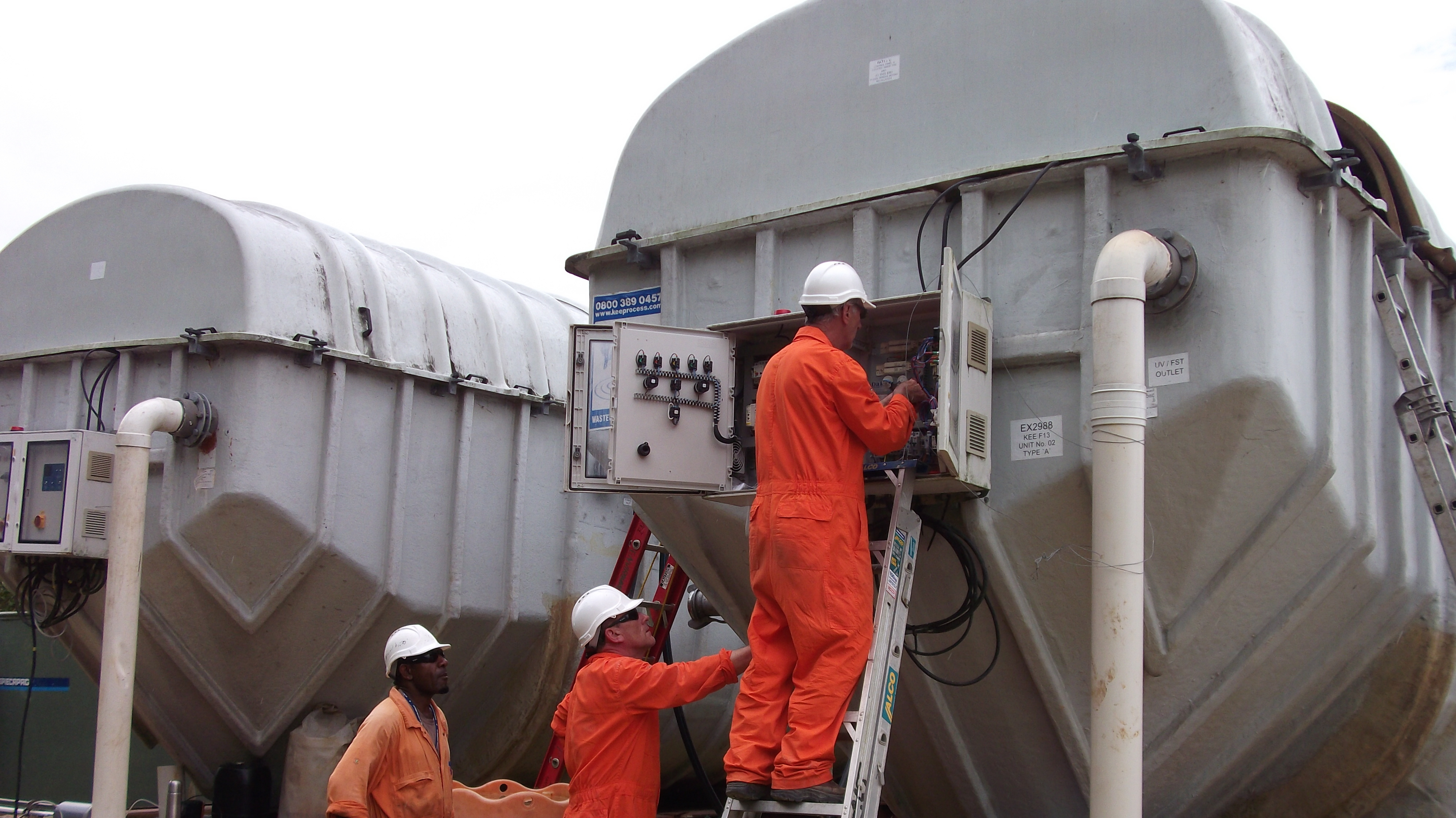 Men working in a recycling facility