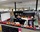 Singapore - Low Jiun Jie's work station at the Singapore Chemical Plant. Row of blood buddy stress balls over the years to raise awareness of blood donation